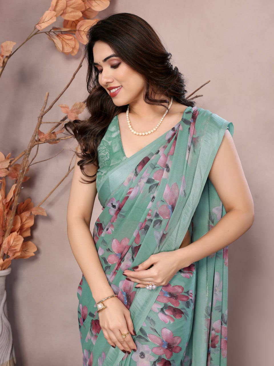 Nityapriya Gopi Printed Moss Satin Patta Saree