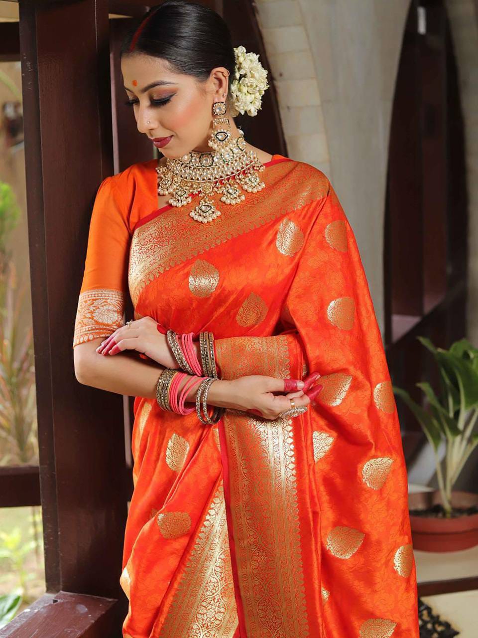 Rich Orange Lichi Silk Saree with Zari Jacquard Work & Contrast Border