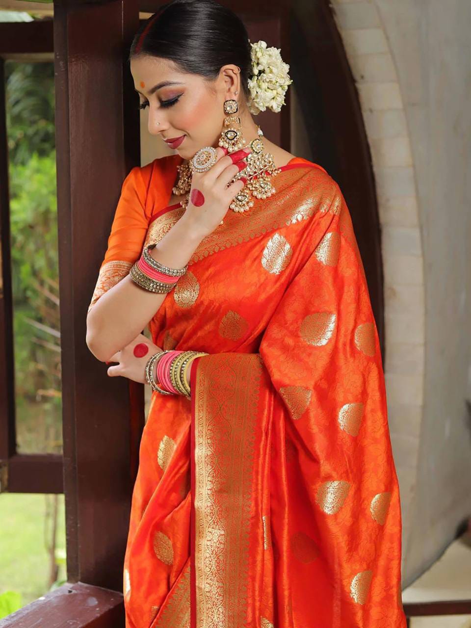 Rich Orange Lichi Silk Saree with Zari Jacquard Work & Contrast Border