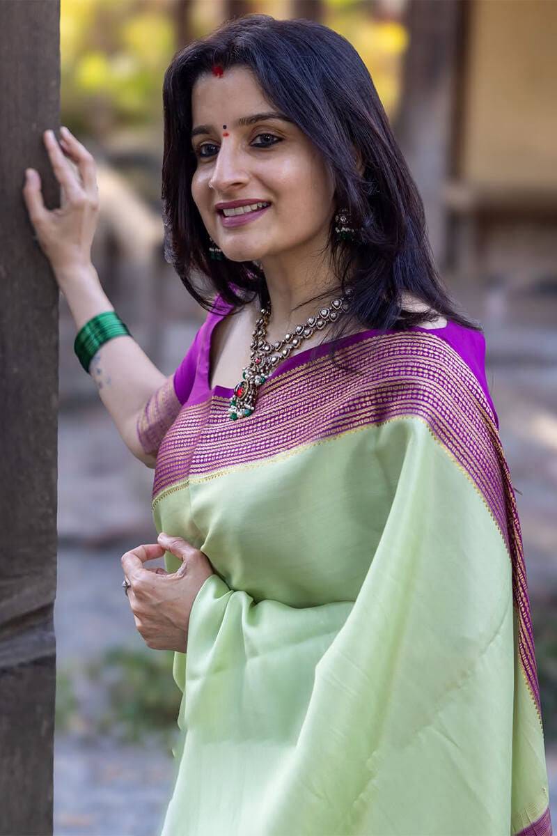 Pista Green Soft Lichi Silk Saree with Purple Contrast Zari Border & Rich Jacquard Pallu